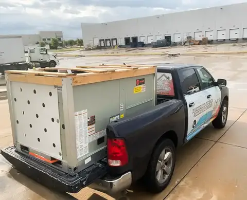 Air Zone Experts truck delivering a brand new HVAC unit for commercial client.
